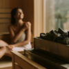 Attractive young woman relaxing in the sauna