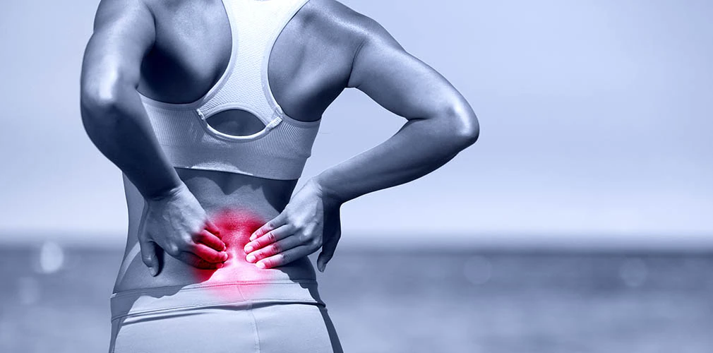 A girl with lower back pain